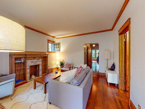 Large living room view looking towards back dining room
