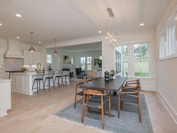 This is a photo of a completed version of the same exact floor plan and the same designer finishes - representative only.