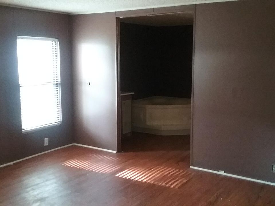 Master bedroom, looking towards master bathroom. 