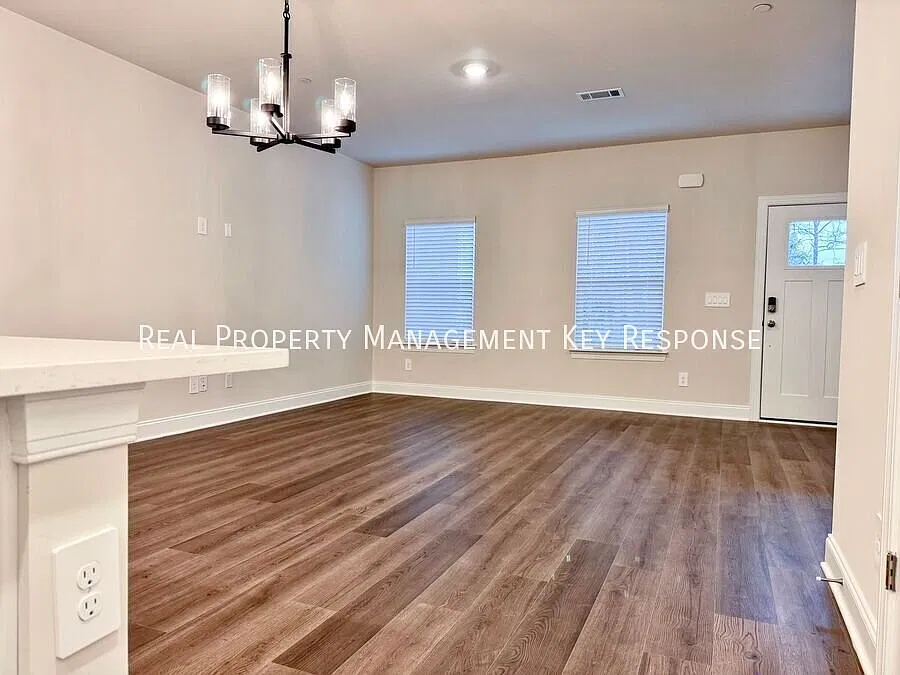 3-Bedroom Harbor Crossing Home with Open Living & a Two-Car Garage — Photo 3