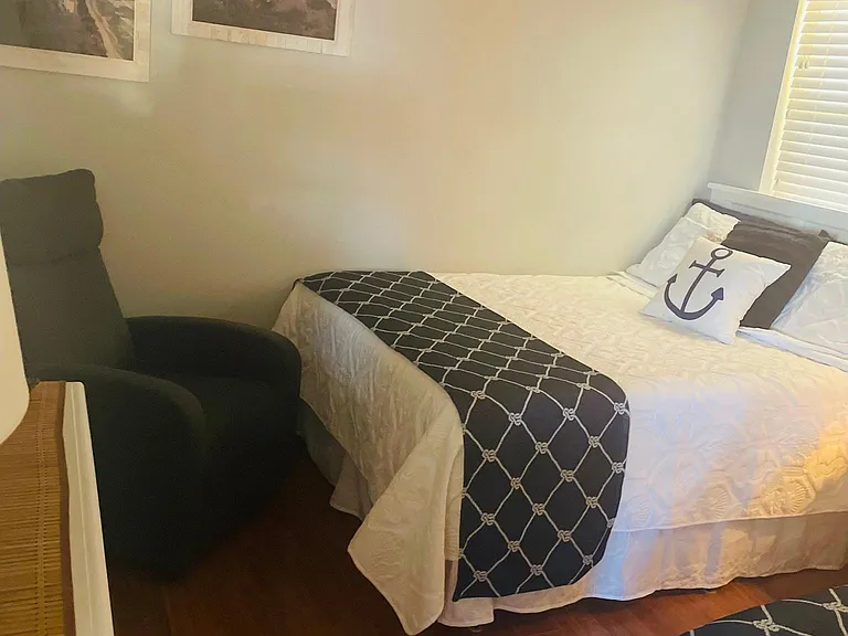Guest bedroom , small chair in corner. Some of my guest have kids that are gamers so that's the gaming chair . When I am there we move that corner chair to the living room for my kids to use .