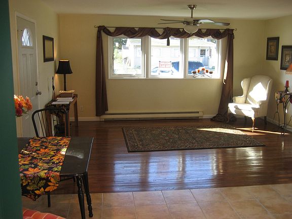 Living Room w/ refinished hardwood floors