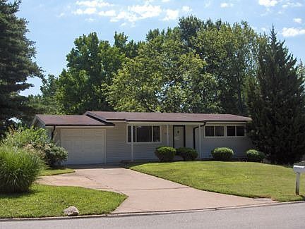 Rambling ranch on al lg. corner lot.