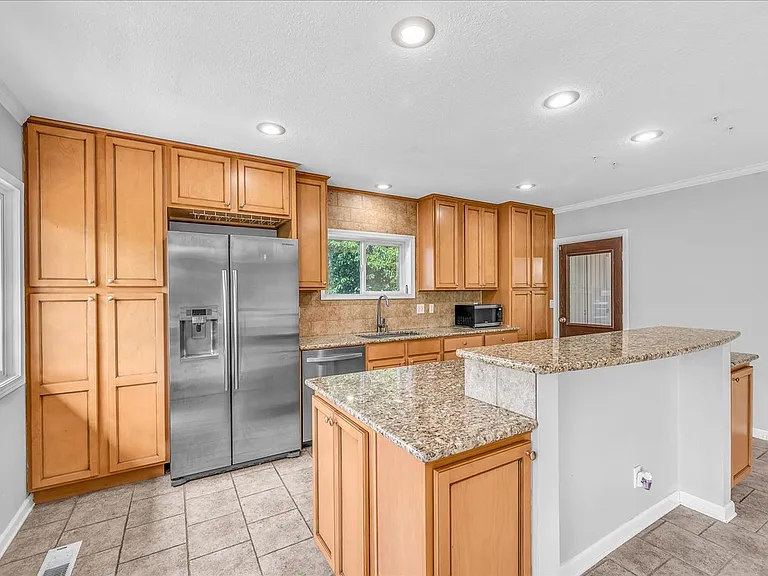 9660 NW Bermar Ln — Photo 6