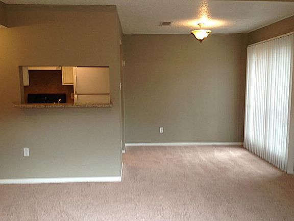 This great open floor plan allows for easy entertaining. Dining room has large windows that bring in