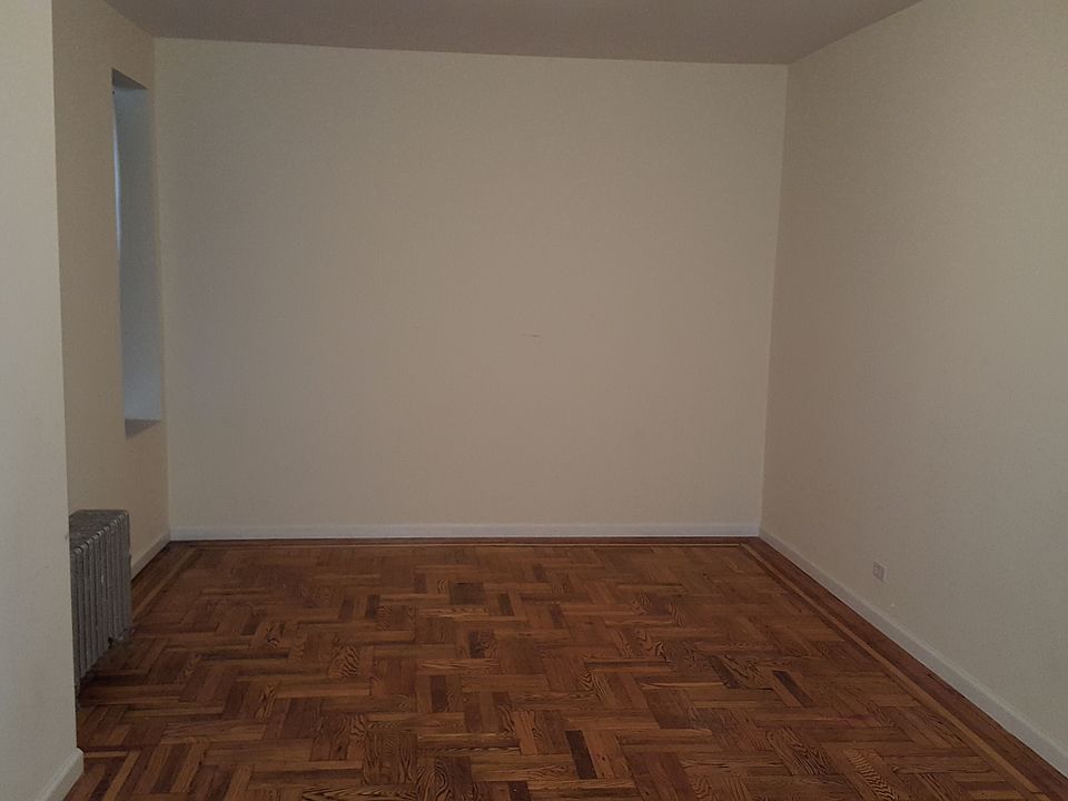1st image of 8742 Elmhurst Ave APT 1h