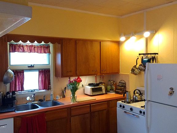 Kitchen with new gas range and powerful dishwasher (we don't wash or rinse dishes before putting them in -- bonus!)