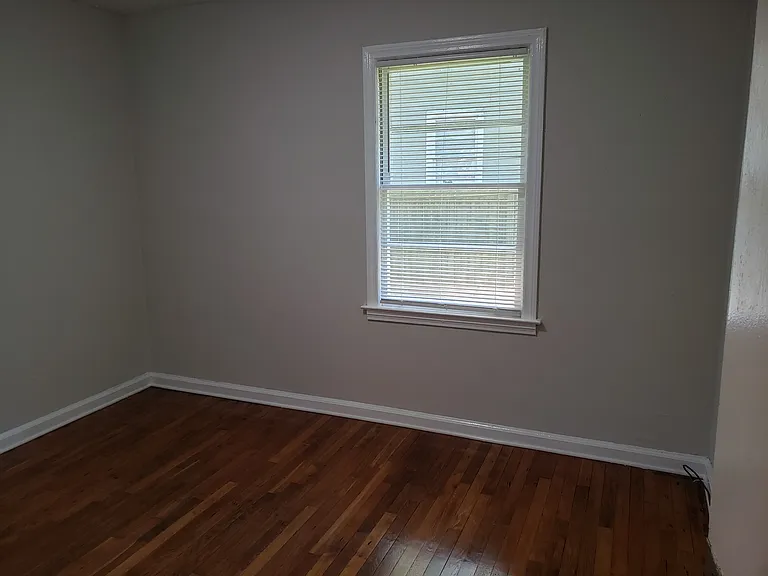 2nd bedroom facing back yard 
freshly painted complete apartment.