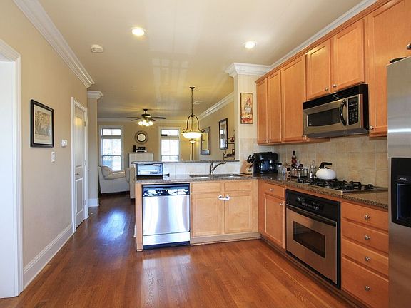 Chef's kitchen is open to the living room.