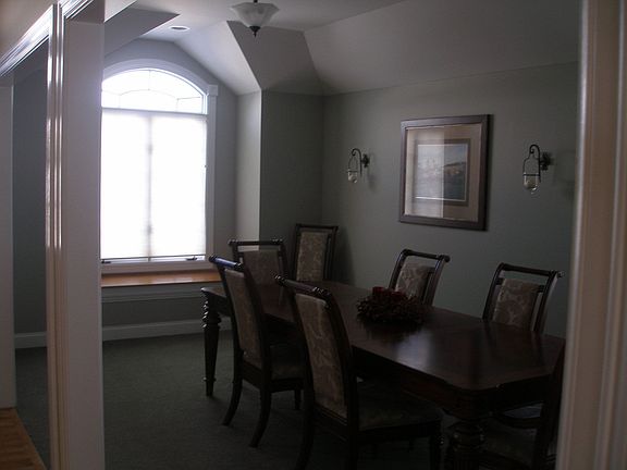 Formal Dining w/window seat and beautiful tray ceiling