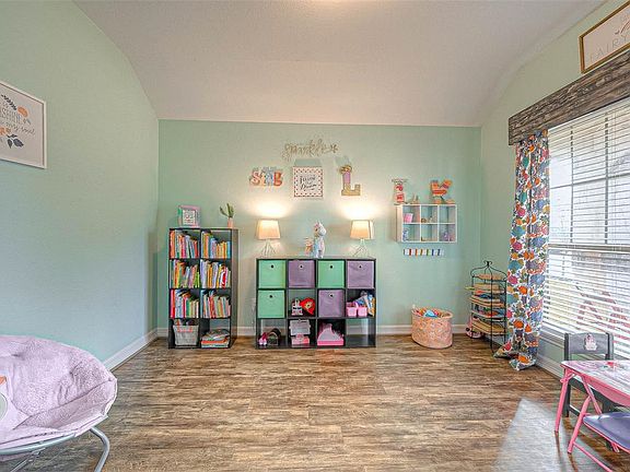 Right off the foyer you'll find an awesome room that can be a study/office, playroom, or home school classroom.