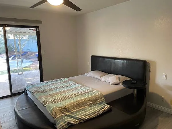 Bedroom with pool access.