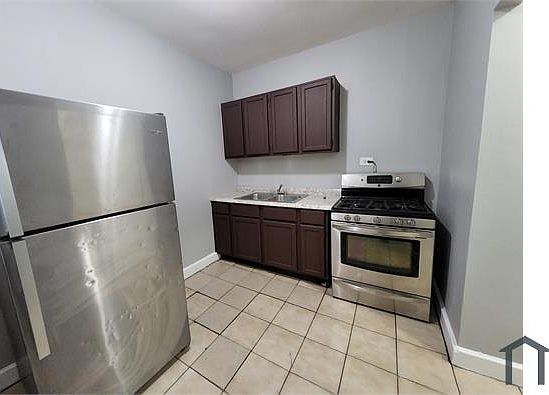 2nd image of 1949 E 73rd Pl #1