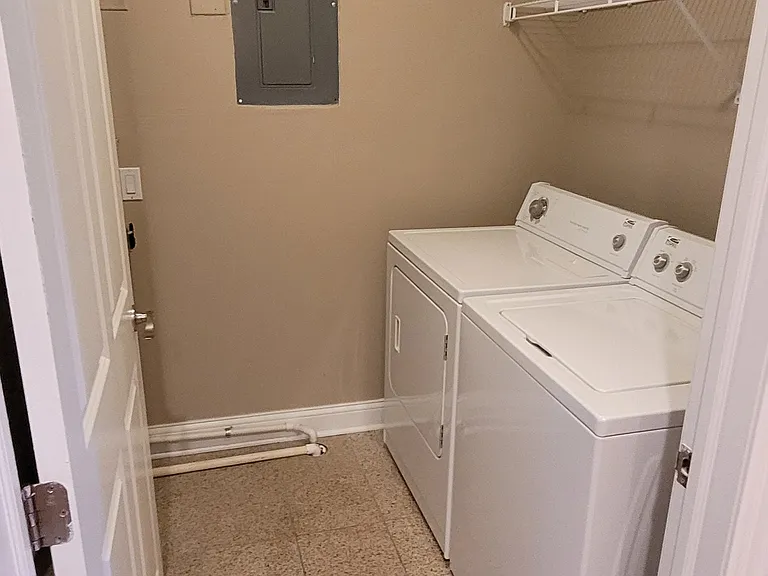 Laundry off kitchen for 2 bedrooms in building 1-4