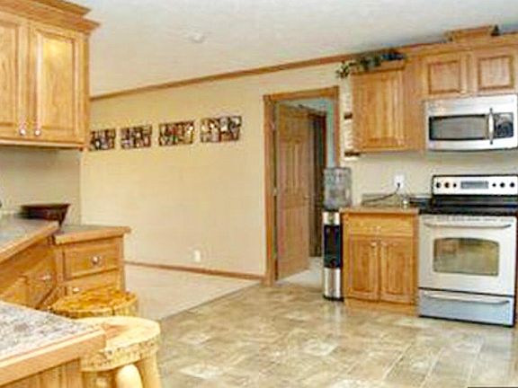 Large kitchen with stainless steel appliances
