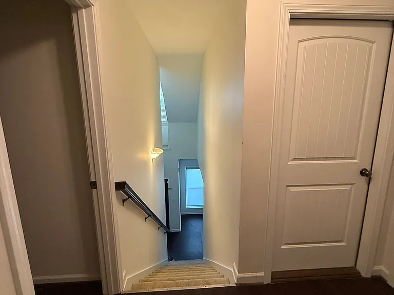 Upstairs bath to the left & walk in attic to the right