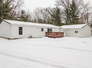 8451 Loveless Dr, Howard City, MI 49329