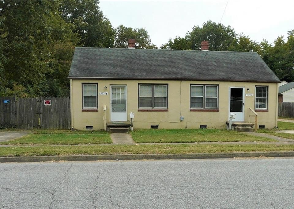 Exterior w/2 driveways
stucco over brick