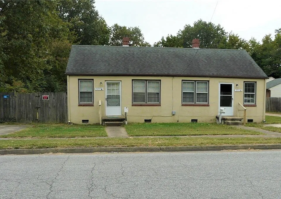 Exterior w/2 driveways
stucco over brick