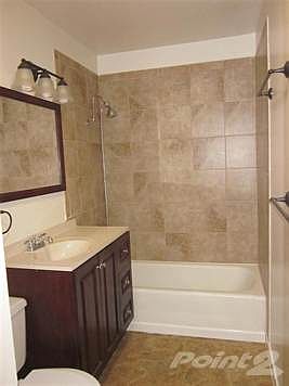 Hall Bath has gorgeous remodel.