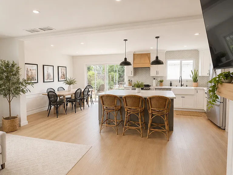 Opens to a large newly remodeled kitchen with a large island