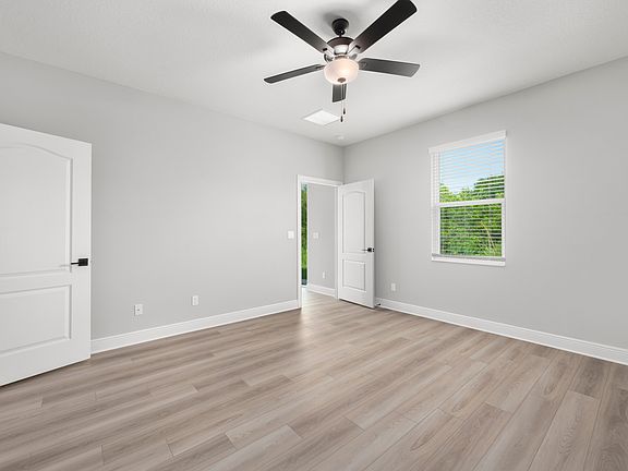 The master bedroom is spacious and has easy access to its own bathroom