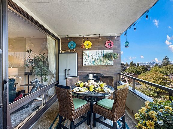 Not all units enjoy an outdoor space to grill. Be a part of the party while minding the barbeque as others relax on the open balcony!>