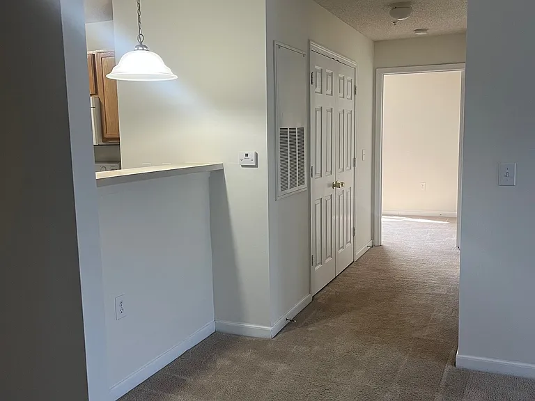 Hallway non-remodeled unit