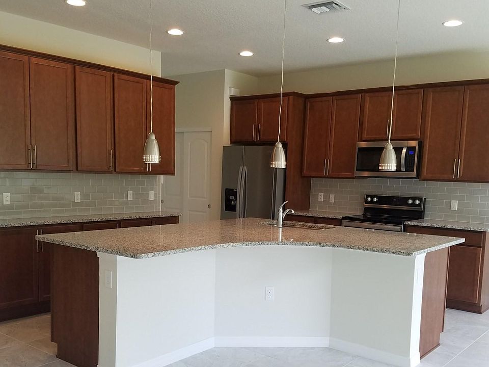 Open layout kitchen with brand new appliances
