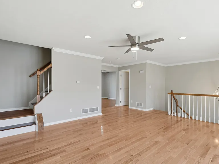 Living Room - With Hardwood Staircase