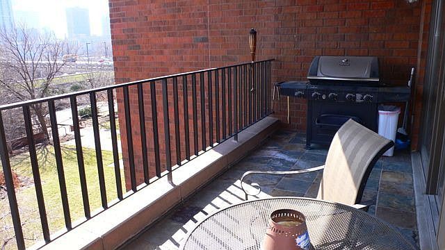 Balcony Overlooking Landscaped Pool Area