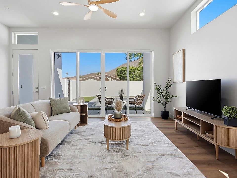 Bright, open living room with abundant natural light and a seamless flow for everyday living and entertaining.