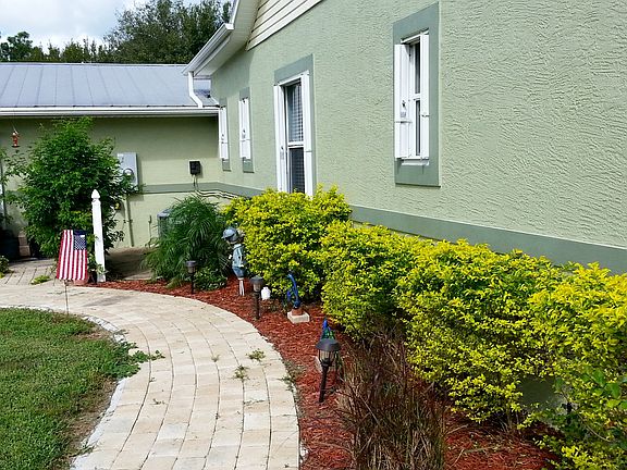 Paver sidewalk to front