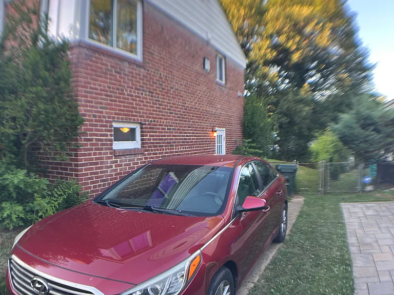 Side entry to lower level behind car.
off street and on street parking.