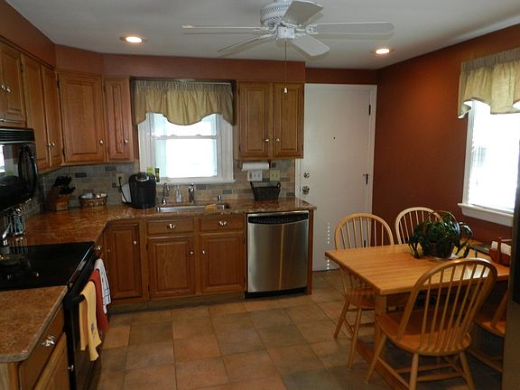 Updated Kitchen with Granite Countertops, Newer Appliances and Cabinetry