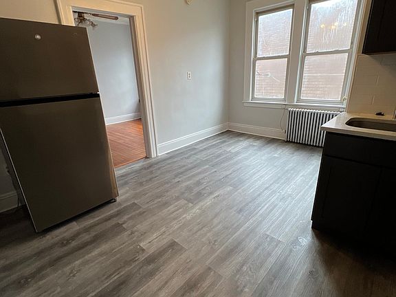 THE LIVING SPACE AND KITCHEN IS ALL IN ONE ROOM / NO SEPARATE LIVING ROOM