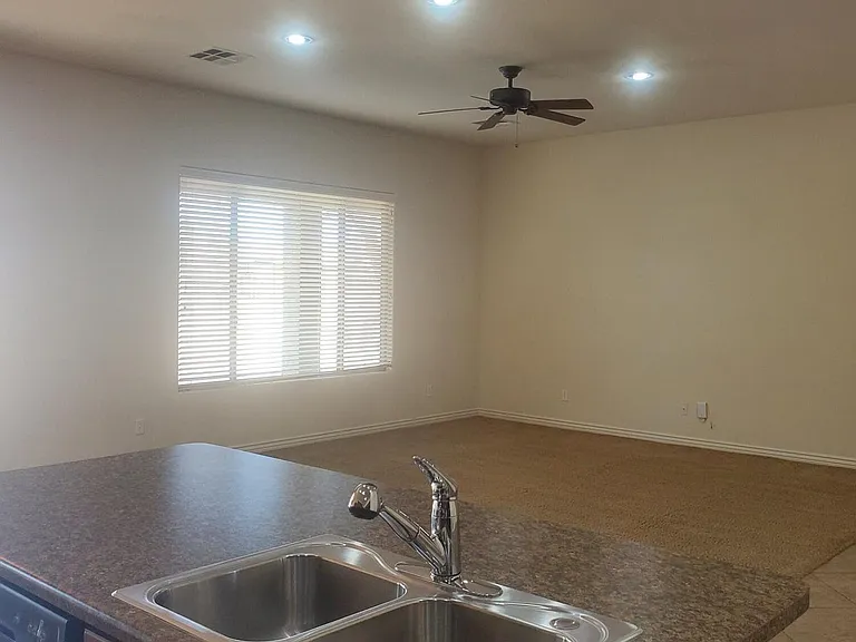 VIEW 2 OF LIVING ROOM.