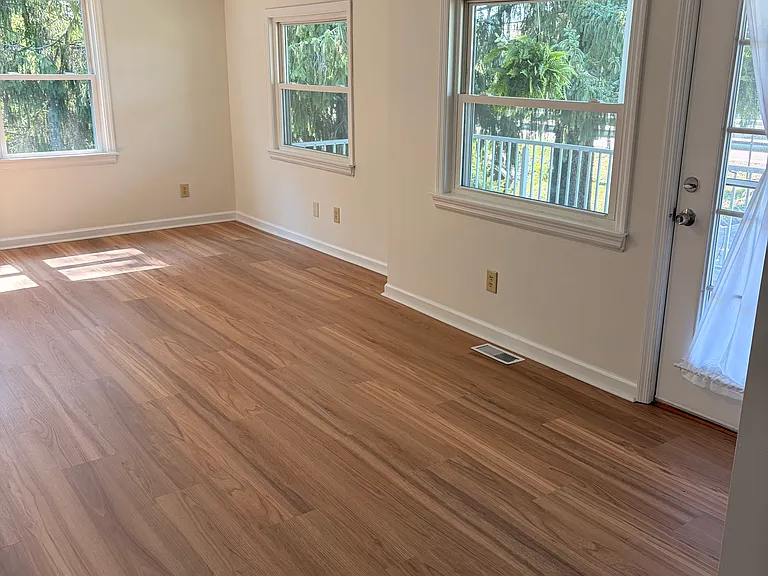 family room with covered front porch