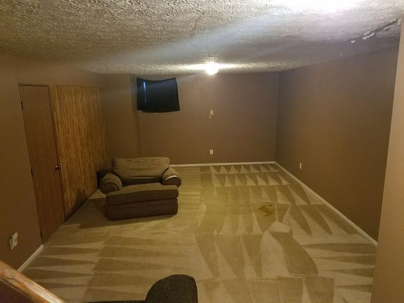 Downstairs from the stairs.