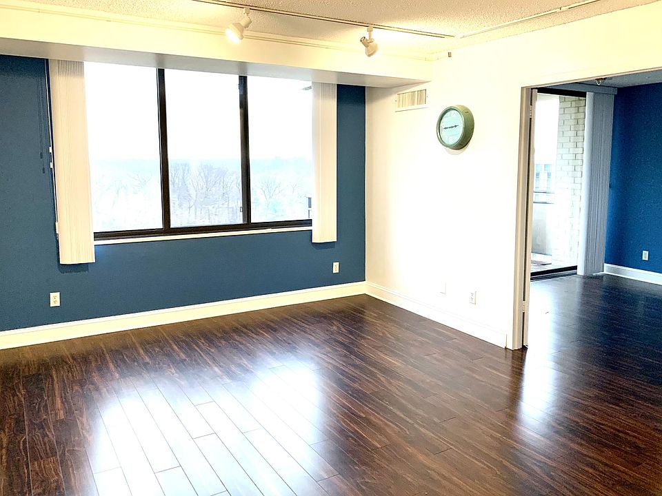 living room with french doors to the den