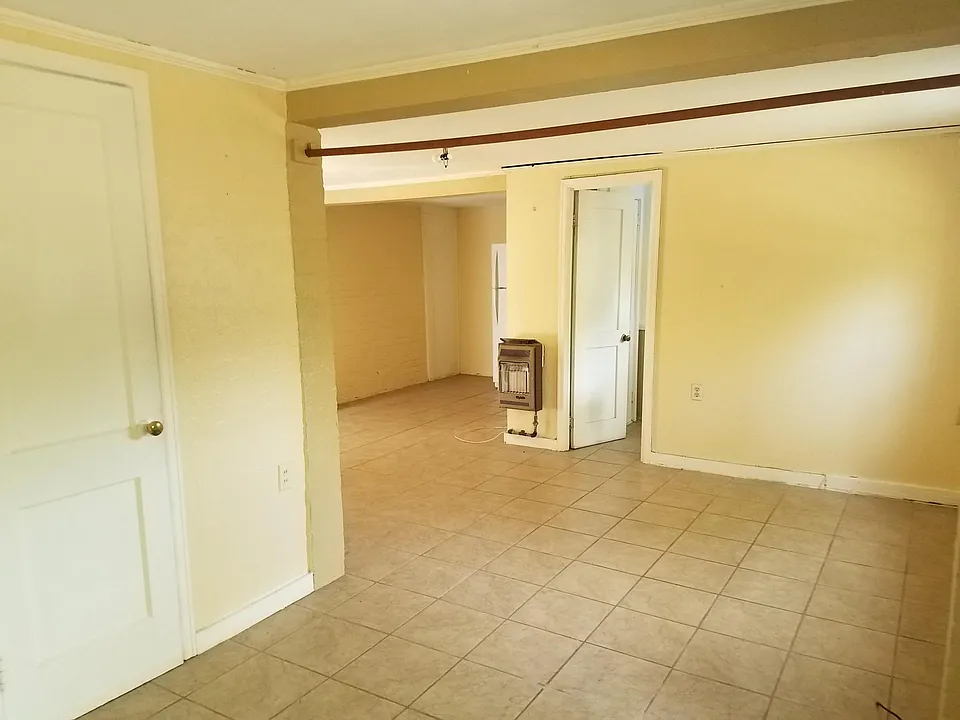 This is the bedroom shooting into the living room. Closet in the left.