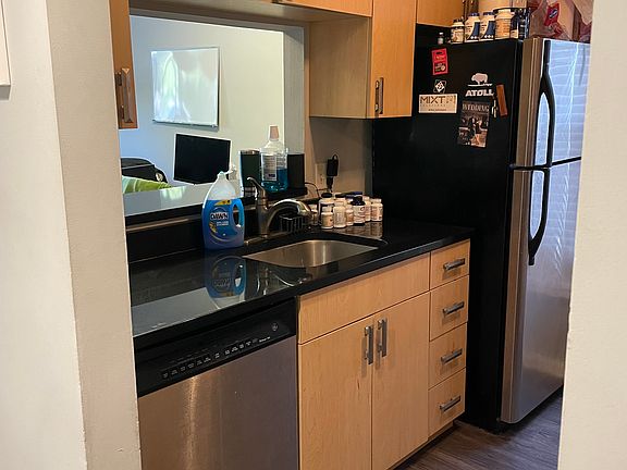 Garbage disposal works very well. New in the last year. Fridge works well. Dishwasher works well.