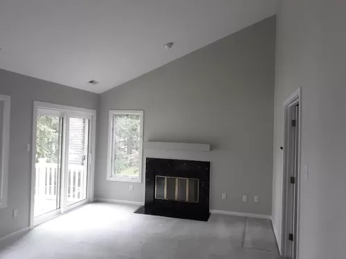 Master bedroom with fireplace and lake views - 5711 Long Cove Rd