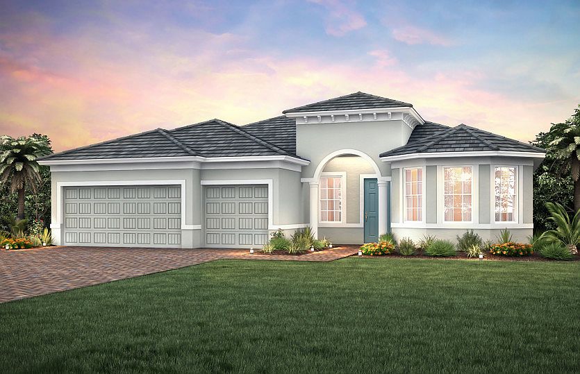 Exterior FM2A with arched entryway and 2-car garage plus golf cart storage
