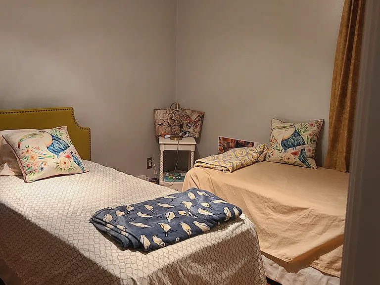 3rd bedroom in the top floor accommodates two twin beds or easily a queen or king sized bed.