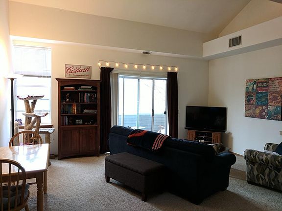 Living room with covered balcony