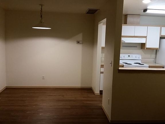 Kitchen has view to Living Rm