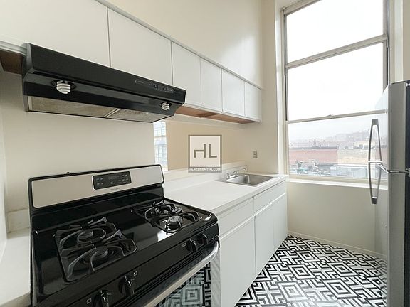 5th image of 6120 Woodside Ave APT 2F