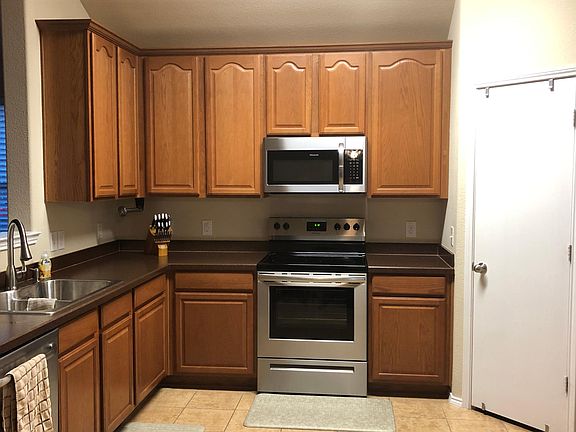 Brand new Frigidaire five burner electric stove and microwave. Counter space is great for those who love to cook!