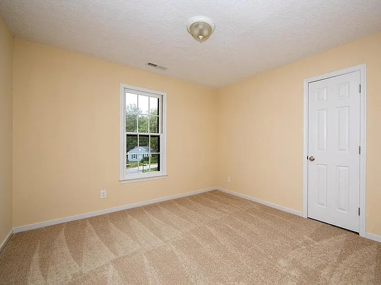 2nd bedroom. This window was replaced with a Pella double-pane window in 2024.